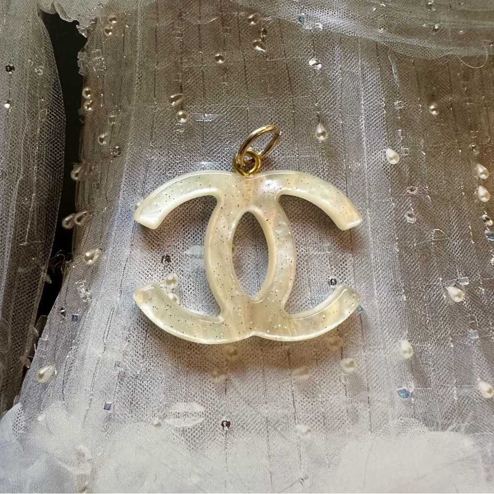 CHANEL Acrylic with Gold Flecks Zipper Pull Charm